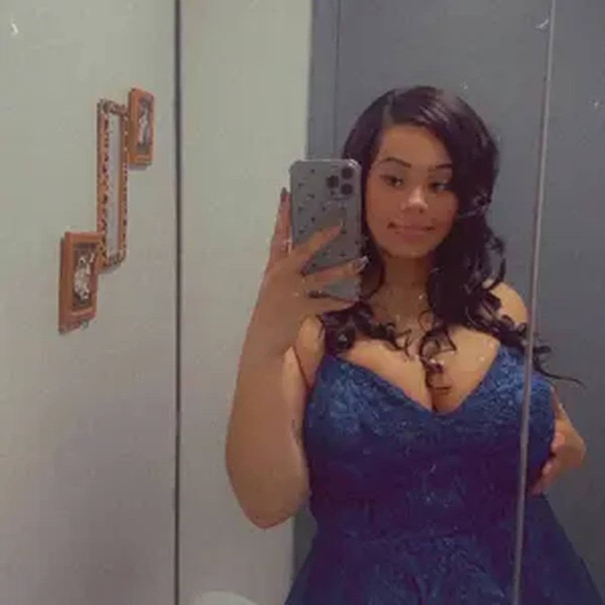 Woman wearing a close-fitting evening dress