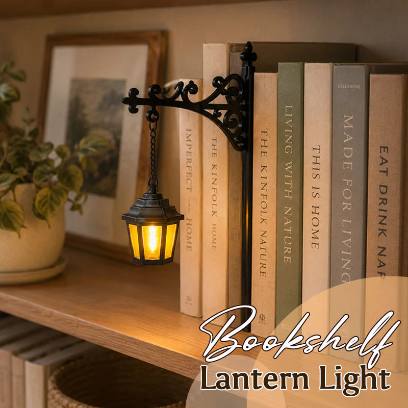 Warm bookshelf lantern light hung from an ornate bracket
